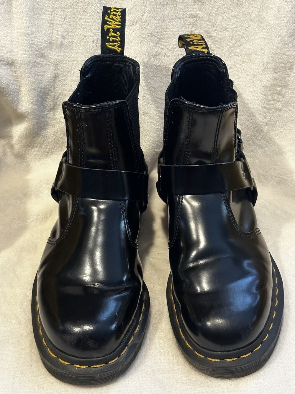 Dr. Martens Black Patent Leather Heeled Boots with Yellow Stitching